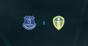 Escudos de Everton e Leeds, que duelam pela Premier League