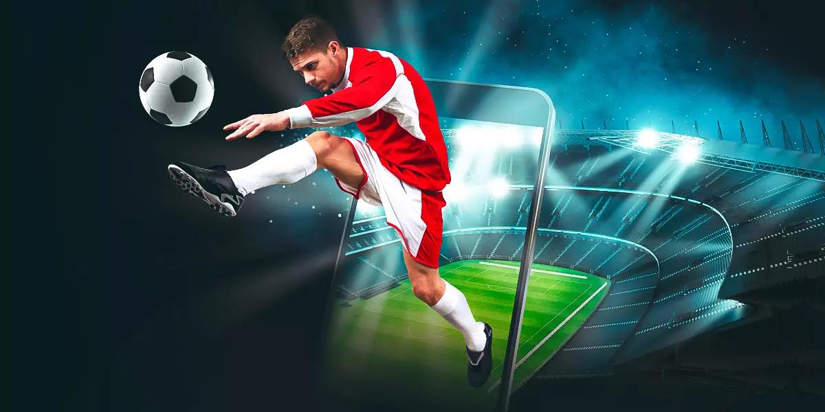 imagem mostra um jogador de futebol saindo da tela de um smartphone com um estádio ao fundo